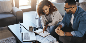 Small Business Owners Going Over Docs